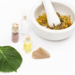 mortar pestle essential oil bottles natural medicine